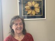 Pam Coste with Sunflower